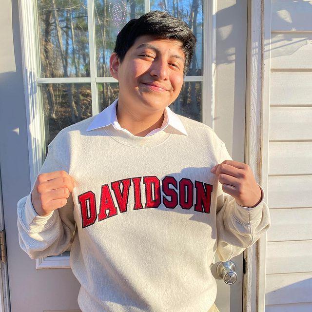 Recently admitted class of 2021 shows off his new Davidson sweatshirt