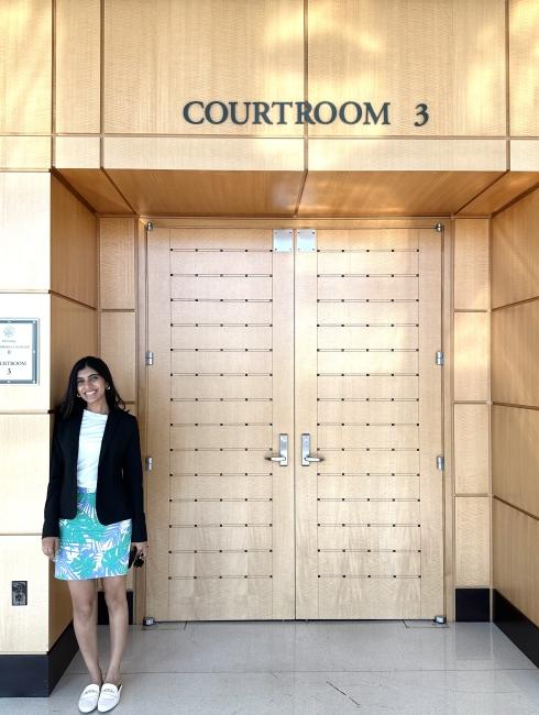 Aditi in the courtroom, where she works as a Litigator at Munger, Tolles & Olson LLP