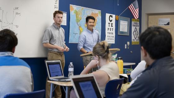 Students teach high school economics class