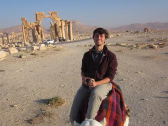 Student Studying Abroad on a Camel