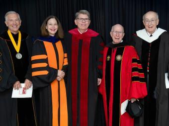 Four former presidents stand beside President Hicks during inauguration