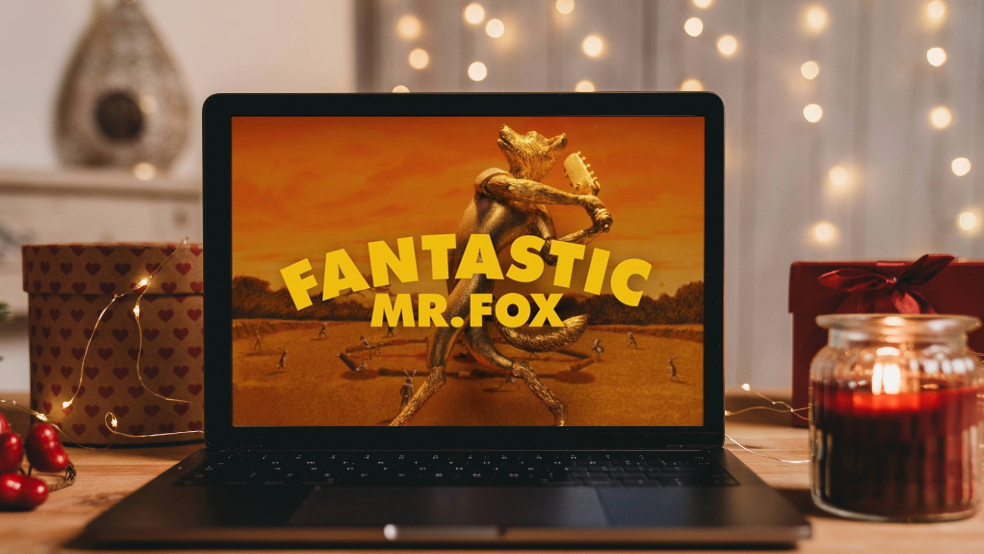 an open laptop with someone watching "Fantastic Mr. Fox"
