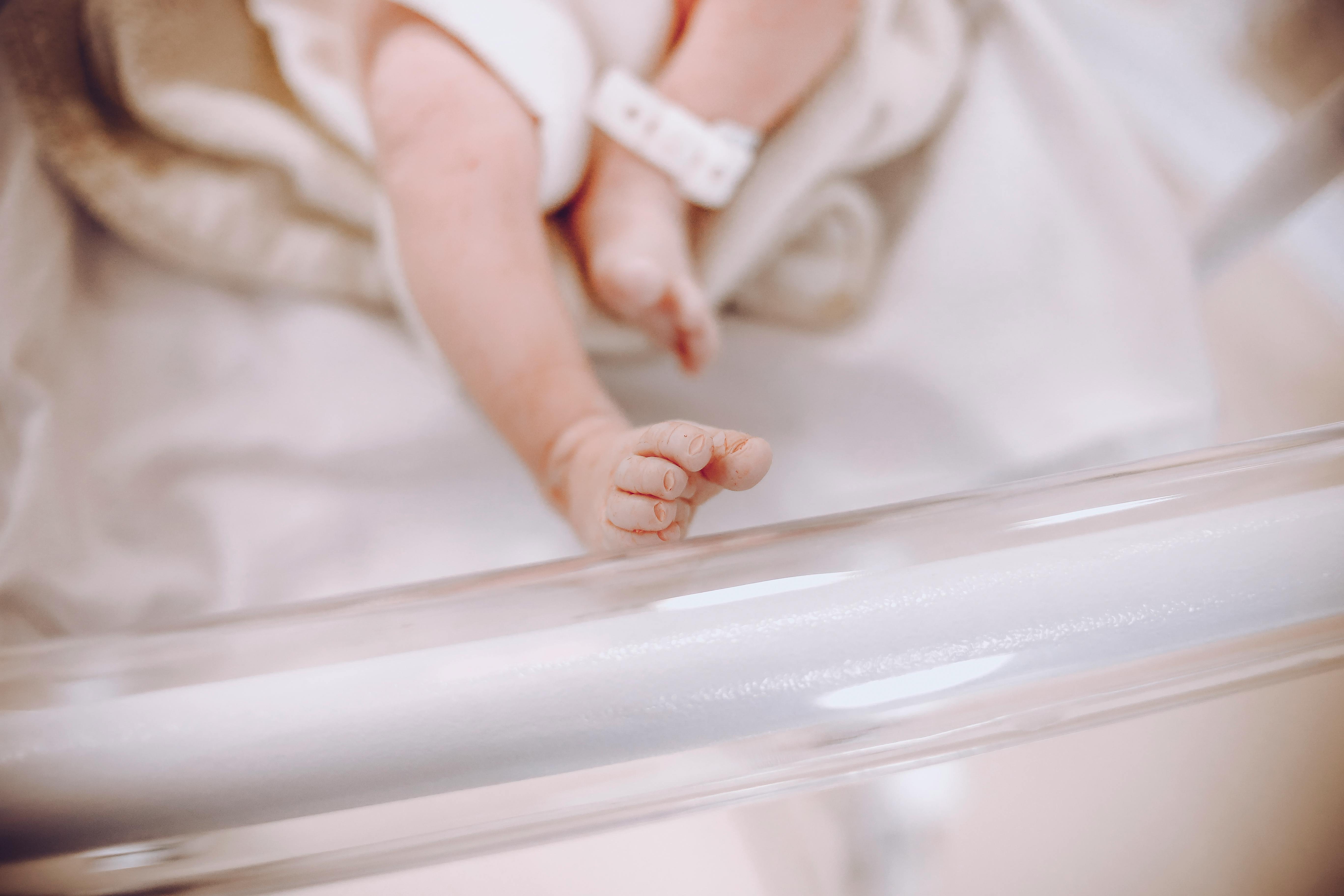baby's feet in a hospital bed
