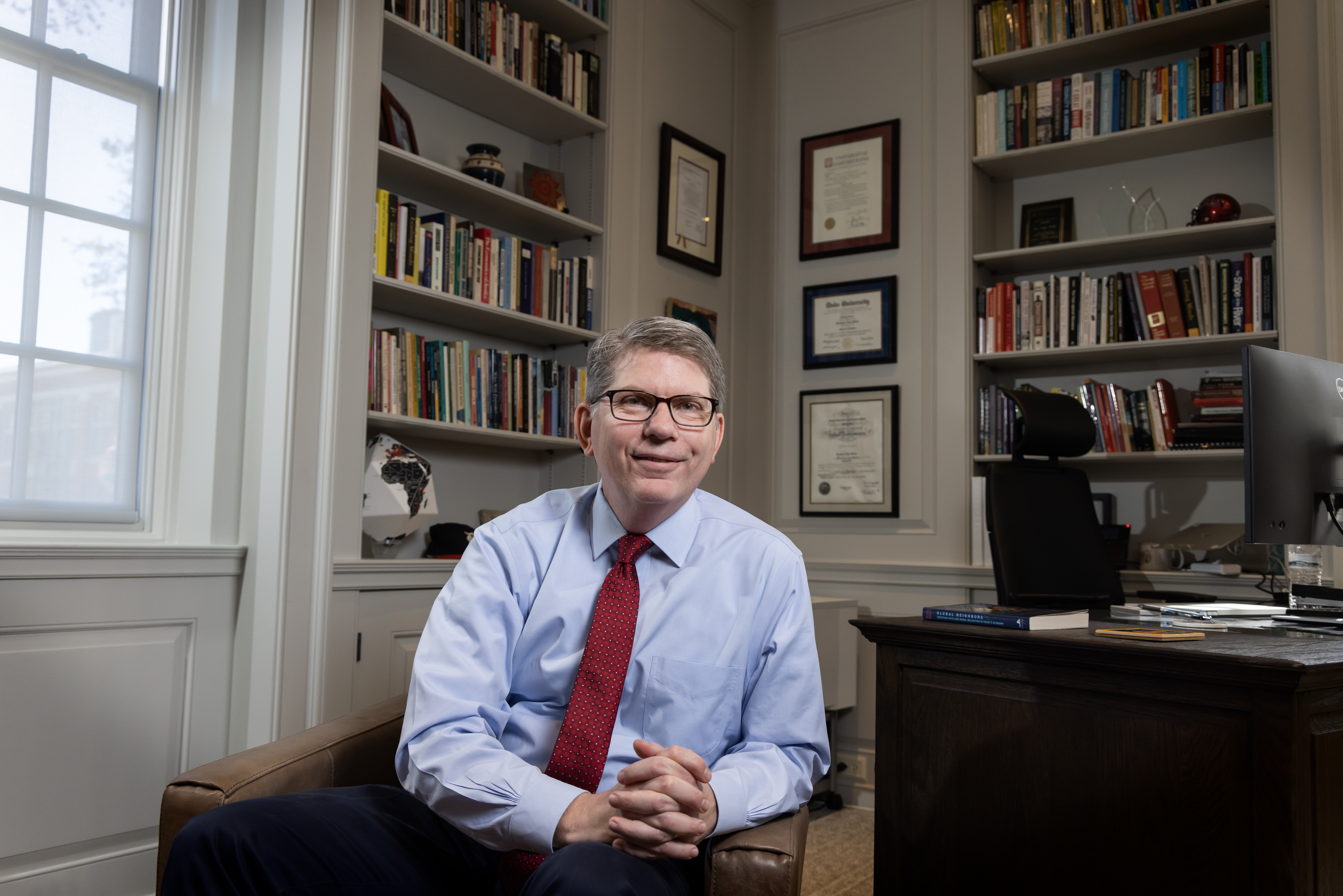 President Douglas Hicks in his office