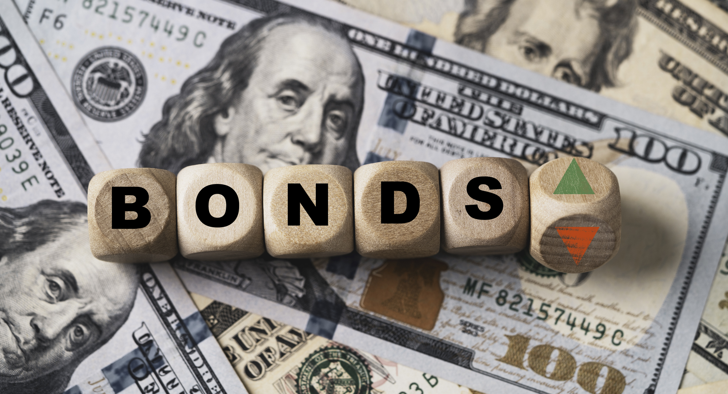 The word Bonds Getty Stock Image with American cash in the background