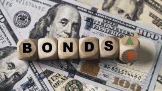 The word Bonds Getty Stock Image with American cash in the background