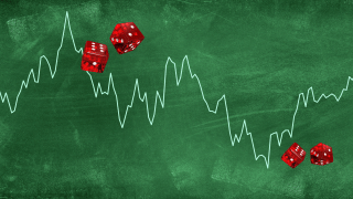 A line graph depicting financial market fluctuations overlaid on a green chalkboard background, accompanied by scattered red dice.
