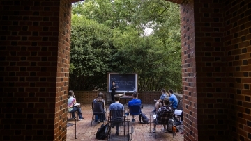 Chinese Studies Outdoor Class with Mandarin Written on Chalk Board