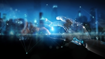 hands touching between a technological barrier