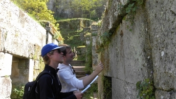 Students examining an inscription at Orvieto