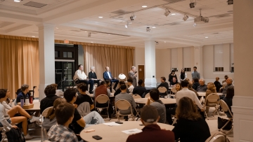 DCI and political science department panel at an event in the Lilly Gallery