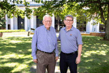 Professor George Abernethy with Davidson College President Doug Hicks ’90