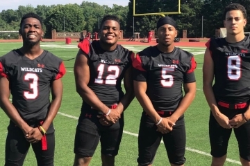 Members of the football team with Jonathan Sheperd-Smith ’18 (#12)