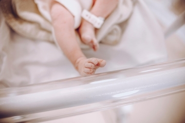 baby's feet in a hospital bed