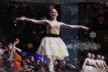 2026 Holiday Video Still Ballerina on stage with orchestra to the side