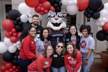 All In for Davidson 2026 Students and Roary under balloon arch