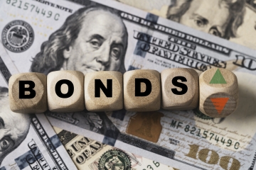 The word Bonds Getty Stock Image with American cash in the background
