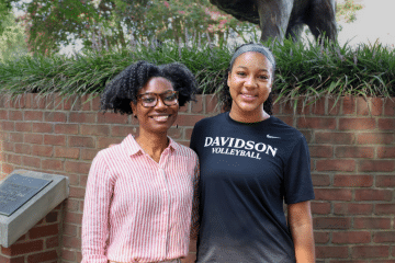 Whitney A. White ’08 and volleyball player Ariyana Johnson ’29