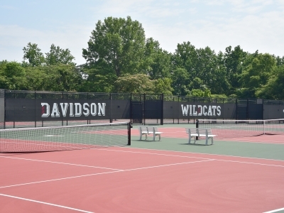 Tennis courts that are branded with Davidson Wildcats