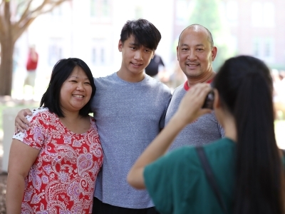 Orientation Farewell Picnic Family w Student Taking Photo