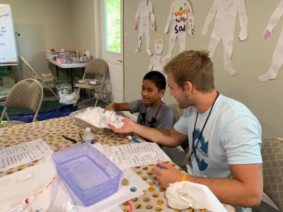Noah Satterfield '20 teaching a student