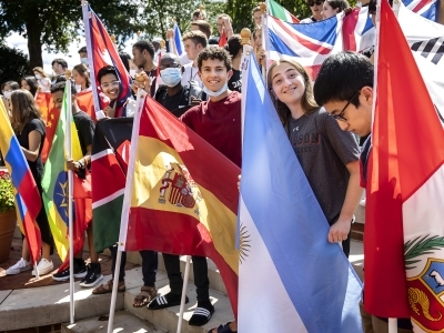 International students holding country flags