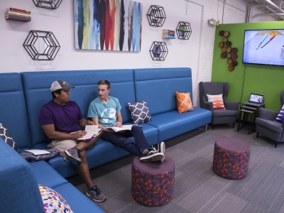 Students working on couch at Lula bell's