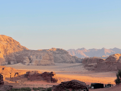 a desert scene at sunset