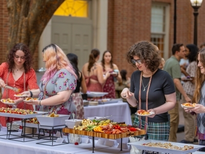 Much Ado Catering people at a buffet
