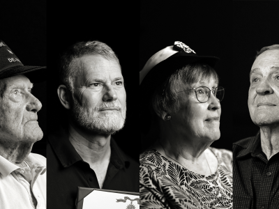 Four people of varying ages look away from the camera in stark lighting