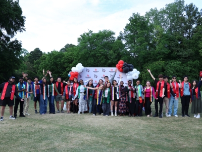 International Student Experience Year-End Event with balloons