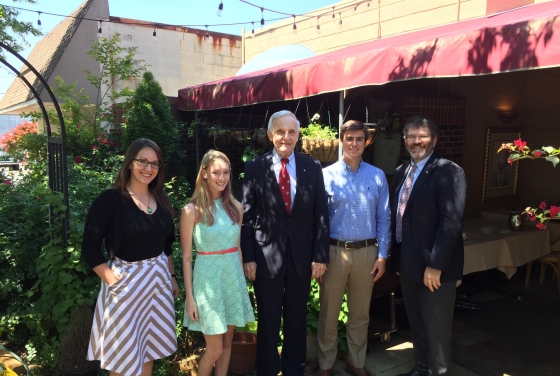 Bremmer poses with students and faculty from Davidson