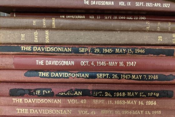 stack of archived books of the Davidsonian