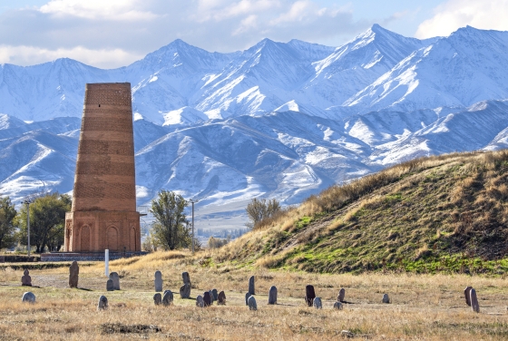 Ancient site of Burana with old minaret and tombstones known as Balbas in Kyrgyzstan