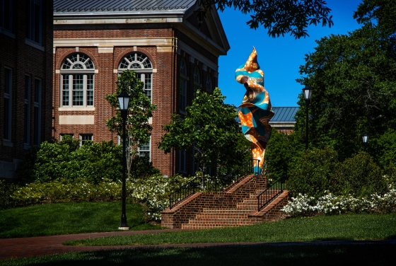 Shonibare Statue with blue sky background