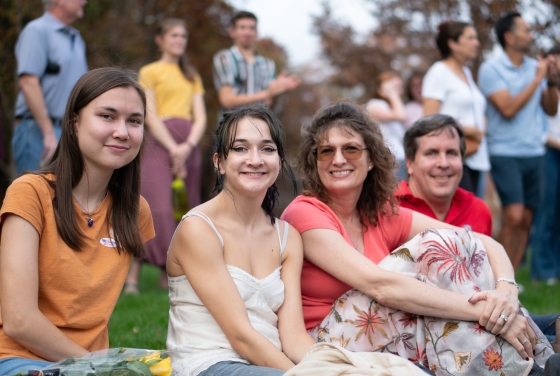 family sitting together at Wildcat Weekend