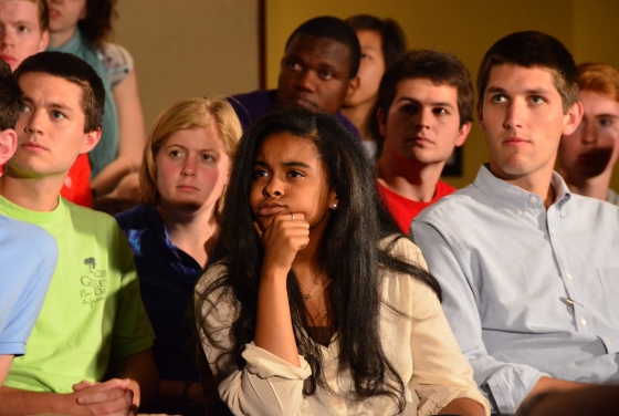 students watching a movie very focused