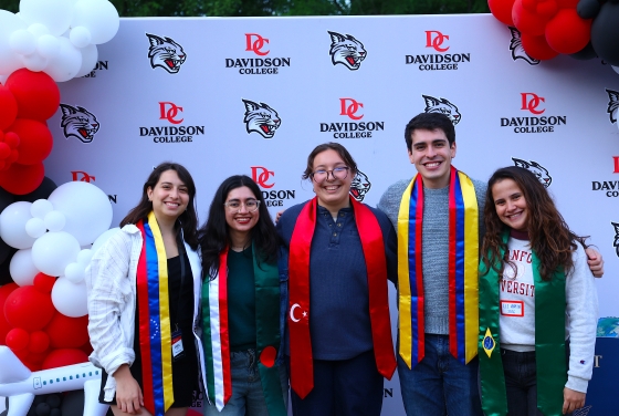 Students with their flags at the International student experience event