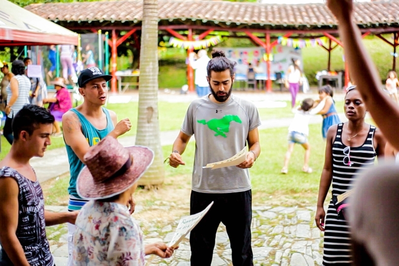 Santiago Navia '17 in Colombia with other people gathered around him
