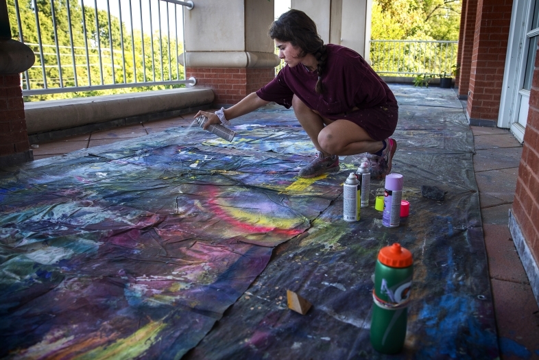 Addie Clark '20 with Paint Cans