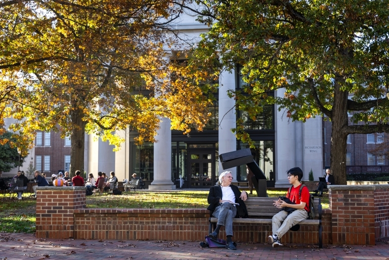 Prof. Greg Snyder Meeting with Student Outside
