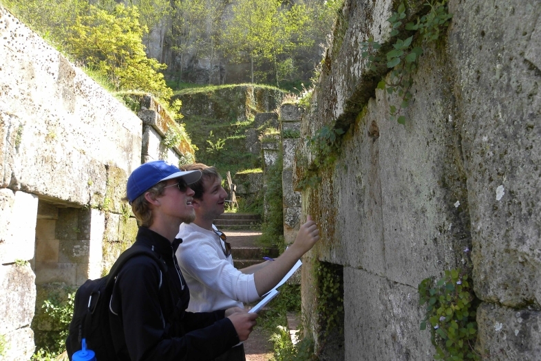 Students examining an inscription at Orvieto