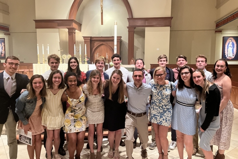 Group of students standing in a Catholic place of worship