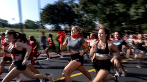 action shot of young women running