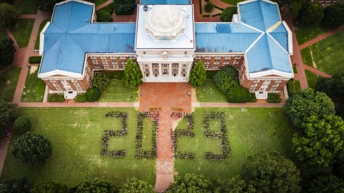 an aerial view of students in the shape of "2029"