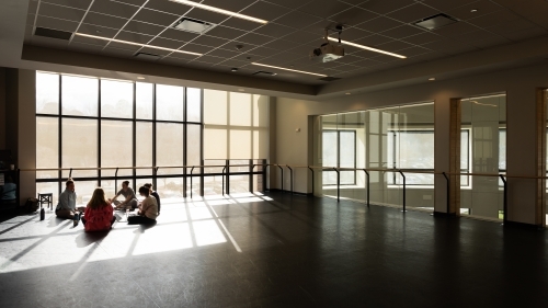 a dance studio with big windows