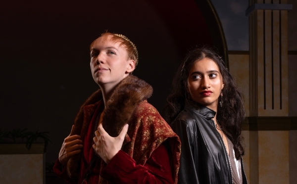 a young man and a young woman in Shakespearean outfits