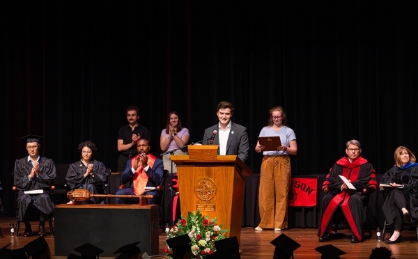Convocation 2025 students, faculty and staff on stage 