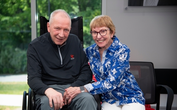 an older white man and his wife sitting together