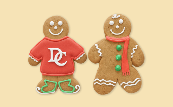 Two gingerbread people with red, white and green icing